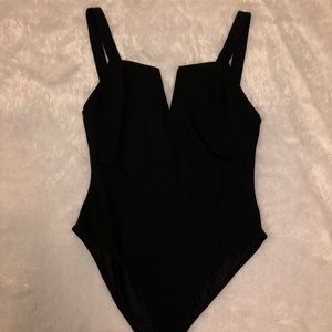 Black bodysuit with V